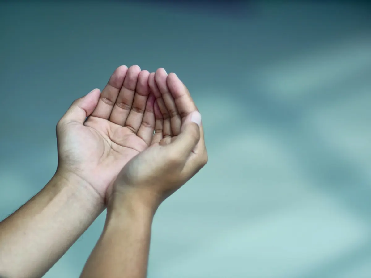 Hands held open in supplication.